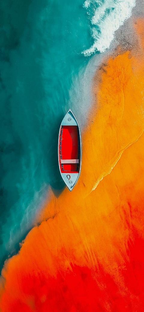boat on orange and blue waters