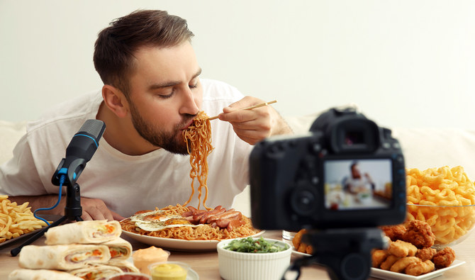 mukbanger eating in front of the camera