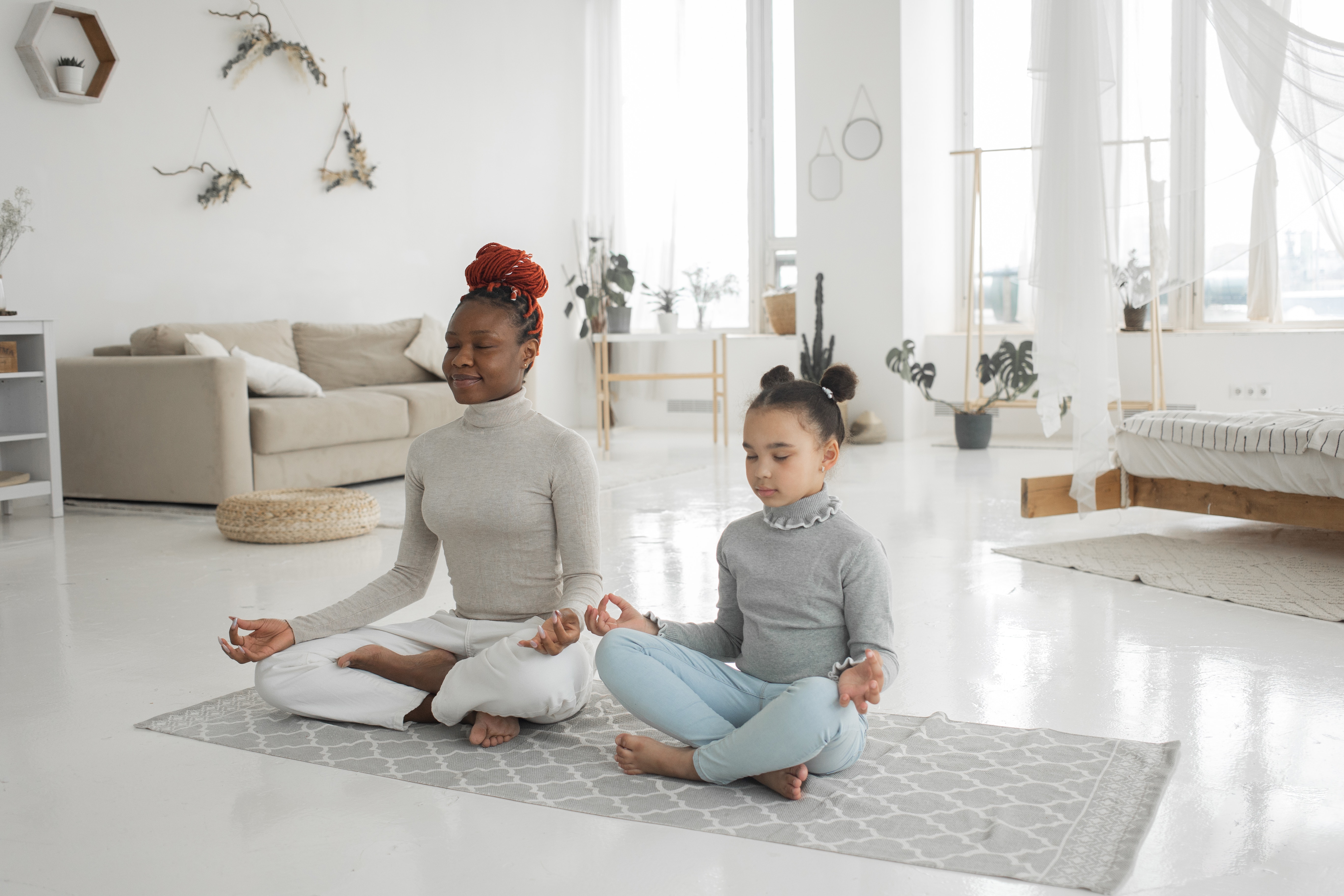 mom and daughter meditating 